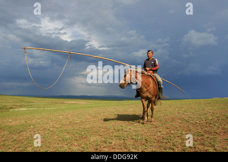 Mongolia, Tov province, nomad, horseman with urga Stock Photo - Alamy
