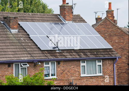 Solar panels on roof of modern house in the city of York North Yorkshire England UK Stock Photo