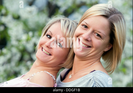 Happy sisters smiling Stock Photo