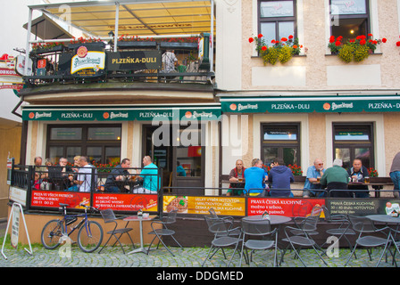 Bar restaurant terrace with local men drinking beer Liberec city Krajský soud region north Bohemia Czech Republic Europe Stock Photo