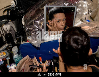 Portland, Oegon, USA. 01st Sep, 2013. Previous pageant winner BEBE J makes up for her showcase performance at the 32nd Annual 2013 La Femme Magnifique International Pageant for female impersonators. La Femme contestants, anatomically correct males who adhere to a strict set of rules prohibiting surgical or hormonal changes to their bodies, rely on their illusionary artistry to wow the judges. © ZUMA Press, Inc./Alamy Live News Stock Photo