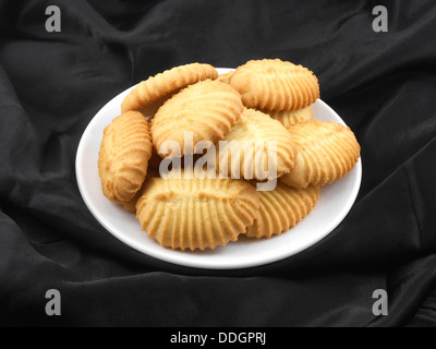 cupcake on black material background Stock Photo