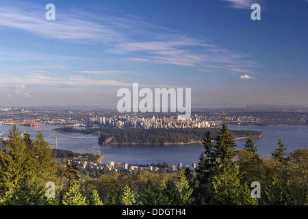 Vancouver BC Canada Cityscape with Stanley Park and Lions Gate Bridge Over Burrard Inlet Stock Photo