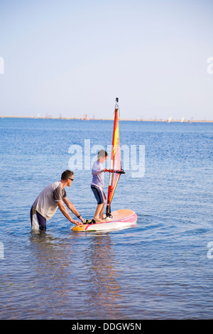 Sailboarding is a popular pursuit at Hilton Dahab Resort on the Gulf of Aqaba, Sinai Peninsula, Egypt. Stock Photo