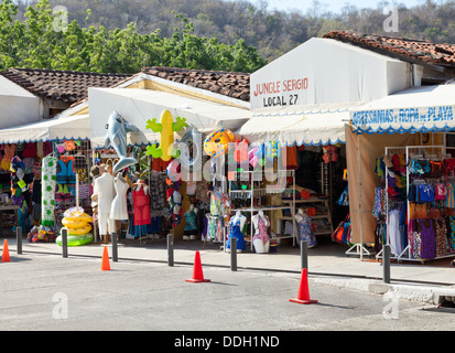 Shopping in Santa Cruz, Huatulco's primary commercial port for tourism, boat tours, restaurants, and other ventures. Stock Photo