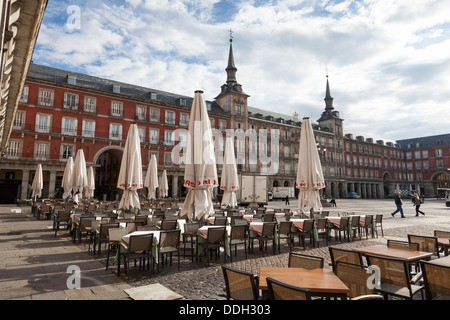 Early morning on the Plaza Mayor - Los Austrias, Madrid, Community of Madrid, Spain. Casa de la Panadería is in the background. Stock Photo