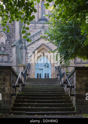 Steps leading to the entrance of St Peters Church in Derbyshire, United Kingdom. Stock Photo