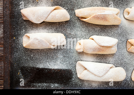 vanilla scones on a baking tray, food top view Stock Photo