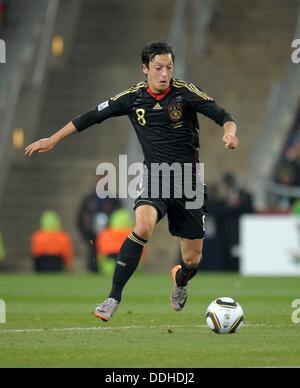 Mesut Oezil of Germany controls the ball during the FIFA World Cup 2010 group D match between Ghana and Germany at the Soccer City Stadium in Johannesburg, South Africa 23 June 2010. Photo: Ronald Wittek dpa - Please refer to http://dpaq.de/FIFA-WM2010-TC Stock Photo