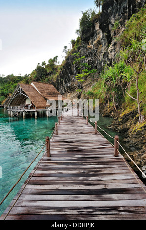 Wooden pier and water bungalows in a holiday resort Stock Photo
