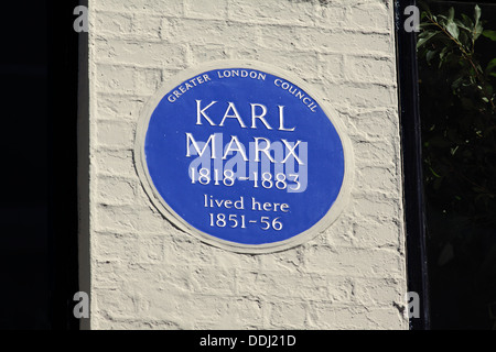 Blue plaque commemorating Karl Marx in Dean Street, London, He lived at this address in Soho in the 1850s.