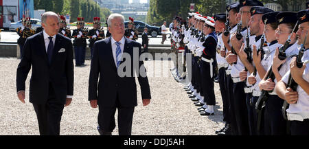 Paris, France. 03rd Sep, 2013. German President Joachim Gauck (R) is received with military honours by French Foreign Minister Laurent Fabius in Paris, France, 03 September 2013. The German head of state is in France for a three-day state visit. Photo: WOLFGANG KUMM/dpa/Alamy Live News Stock Photo