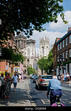 Cars bikes traffic congestion queuing and the Minster in summer Museum Street York North Yorkshire England UK United Kingdom GB Great Britain Stock Photo
