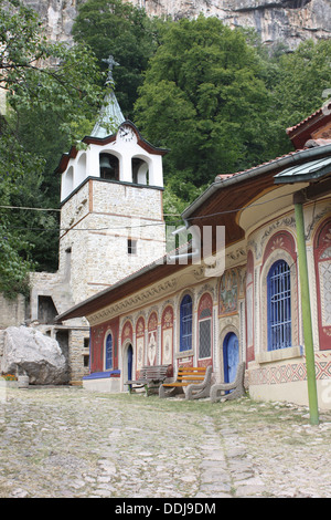 Bell tower and chapel wall at the Monastery of the transfiguration of God in Veliko Tarnovo, Bulgaria. Stock Photo