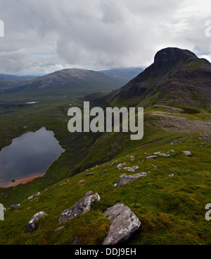 The Scottish mountain Spidean Coinich (a Corbett) on Quinag with Lochan Bealach Cornaidh seen from the ridge to the north. Stock Photo