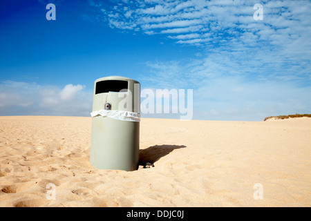 Ashcan in the sand desert Stock Photo