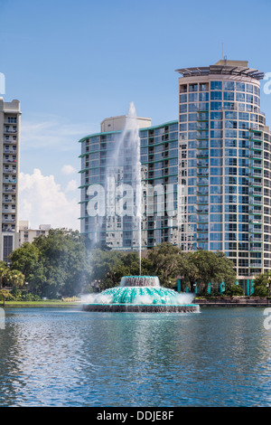 High rise buildings behind the fountain at Lake Eola in downtown Orlando Florida Stock Photo