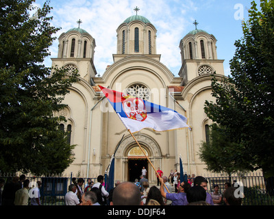 Wedding celebration in front of Orthodox church in Serbia Stock Photo