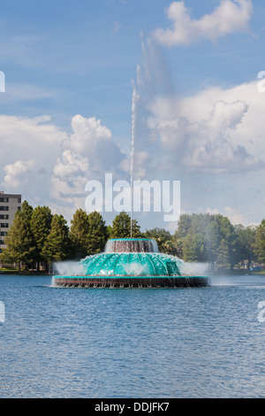 High rise buildings behind the fountain at Lake Eola in downtown Orlando Florida Stock Photo