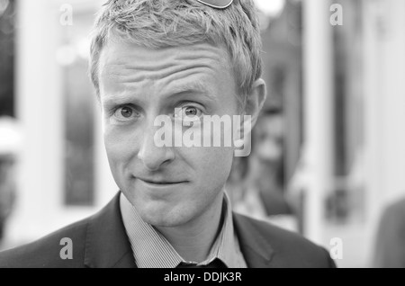 Blonde man in suit with tie in Black and White Stock Photo