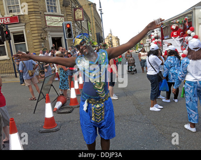 Costumed dancers from Huddersfield Carnival 2013 African Caribbean parade street party Stock Photo