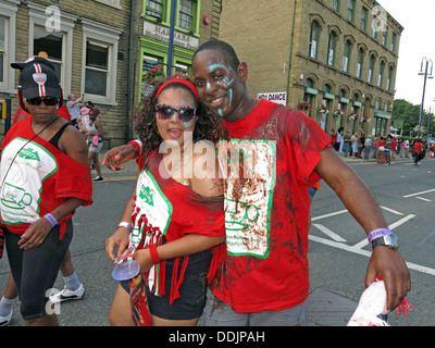 Costumed dancers from Huddersfield Carnival 2013 African Caribbean parade street party Stock Photo