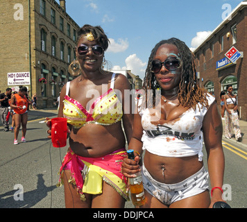 Costumed Caribbean dancers from Huddersfield Carnival 2013 African Caribbean parade street party Stock Photo