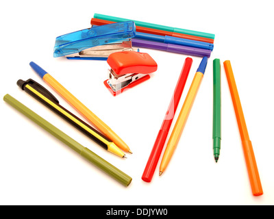 Felt-tip pens, stapler and paint on a white background Stock Photo