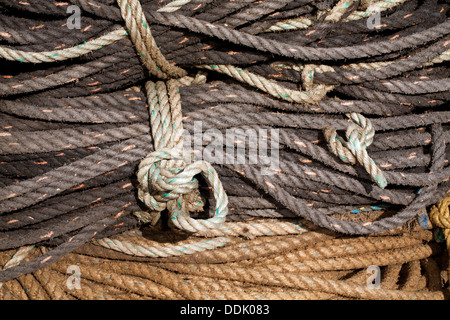Coils of rope for lobster pots on a quayside. Aberystwyth, Ceredigion, Wales. January Stock Photo