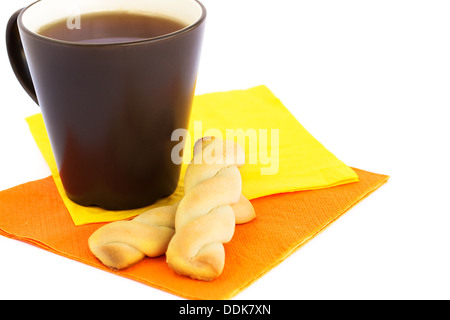 Cup of tea and cookies isolated on white background. Stock Photo