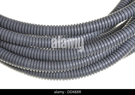 Gray plastic corrugated pipe isolated on white background Stock Photo