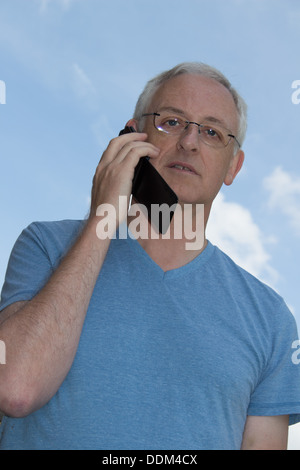 Man using smartphone Stock Photo
