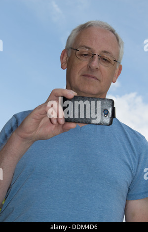 Man using smartphone Stock Photo