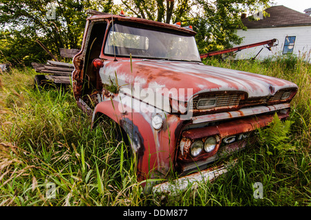 old wrecking car in countryside in Maine, Usa Stock Photo