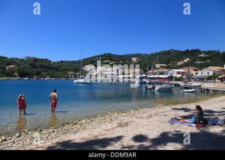 Turisuts paddling in thew sea at Agios Stephanos in North East Corfu Stock Photo