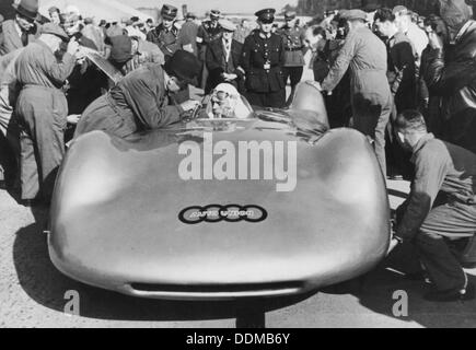 Bernd Rosemeyer and Ferdinand Porsche with Auto Union, c1937-c1938. Artist: Unknown Stock Photo