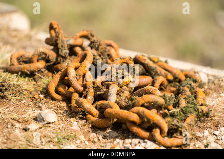Rusty chains abandoned on the Quayside Stock Photo