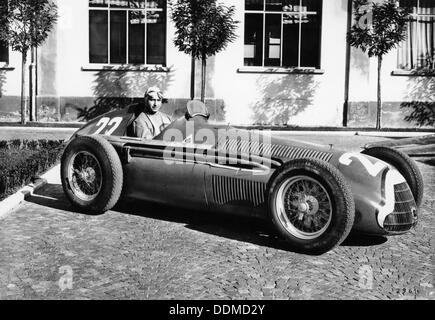 Fangio in Alfa Romeo, prior to the San Remo Grand Prix, Italy, 1950. Artist: Unknown Stock Photo