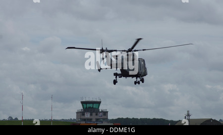 Royal Navy Army AgustaWestland future Lynx Wildcat AW159 helicopter hovering airshow armed forces day zz405 Stock Photo