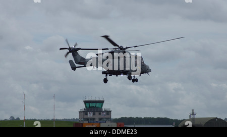 Royal Navy Army AgustaWestland future Lynx Wildcat AW159 helicopter hovering airshow armed forces day zz405 Stock Photo