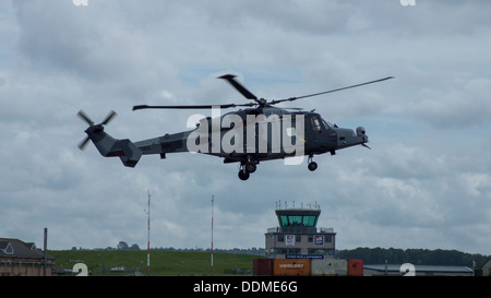 Royal Navy Army AgustaWestland future Lynx Wildcat AW159 helicopter hovering airshow armed forces day zz405 Stock Photo