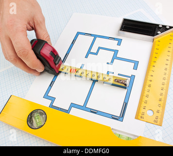 development drawings and tools on graph paper Stock Photo