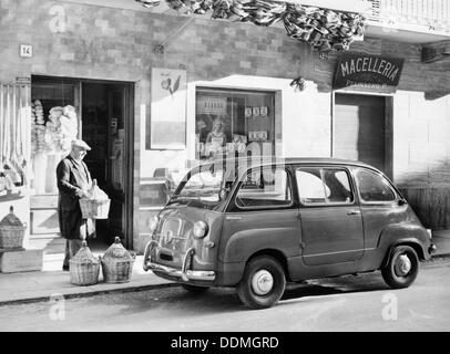 Fiat 600 Multipla outside a shop, (c1955-c1965?). Artist: Unknown Stock Photo