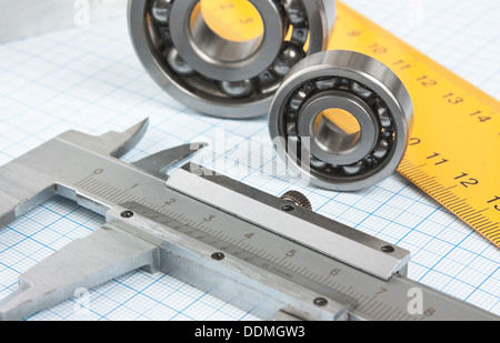 setsquare and calliper with bearing on graph paper Stock Photo