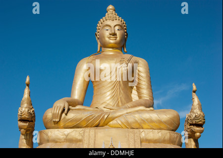 Statue Of Buddha Made Of Pure Gold Surrounded By Flowers And Offerings ...