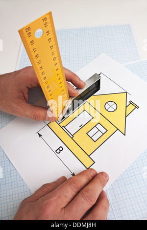 development drawings and tools on graph paper Stock Photo