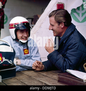Jackie Stewart and Graham Hill chatting, Monaco Grand Prix, Monte Carlo, 1966. Artist: Unknown Stock Photo