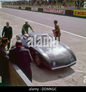 Jackie Stewart getting into a Rover BRM turbine, Le Mans, France, 1965. Artist: Unknown Stock Photo