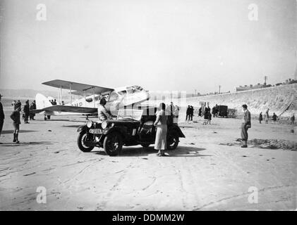 Riley Kestrel and a Dragon aircraft on a beach, 1934. Artist: Unknown Stock Photo
