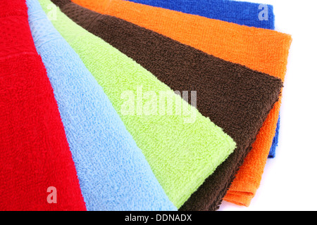Colorful towels on white background. Stock Photo